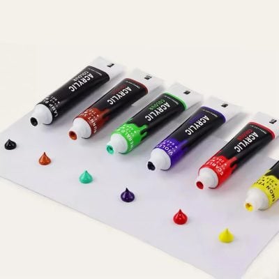 Vibrant aquarelle paint tubes in various colors, ideal for eye care products and optical applications, displayed on white background.