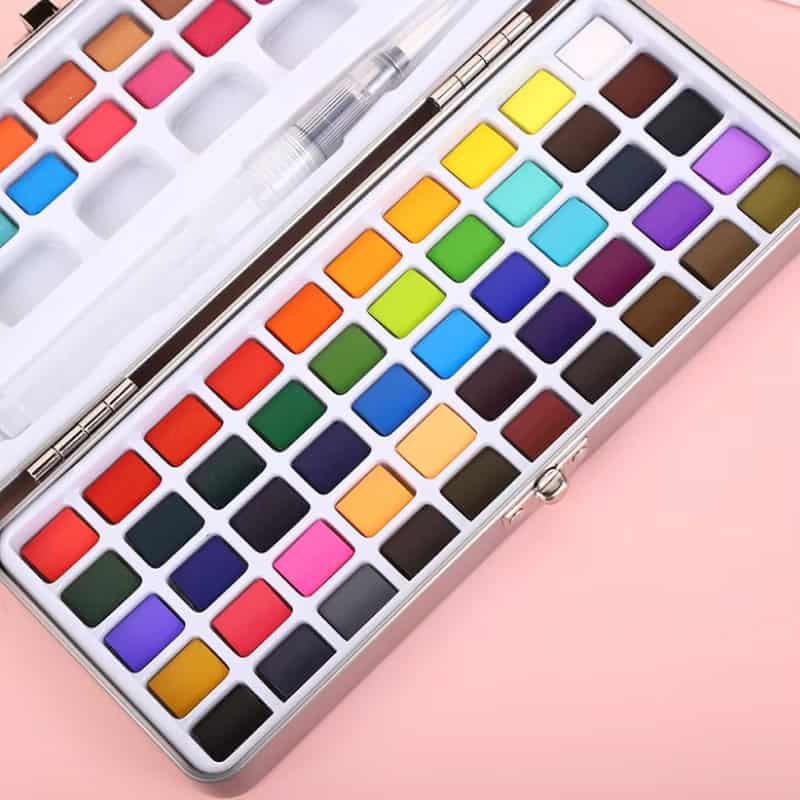 Vibrant watercolor paint set in a sleek metal case, perfect for professional and hobby artists. Features a wide range of bright and pastel colors for creative artistry and detailed work.,.