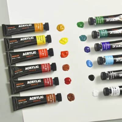 Vibrant acrylic paint tubes and color swatches from Monalisa Store, ideal for art and cosmetics projects, showcasing high-quality pigments for creative makeup and artistic applications.