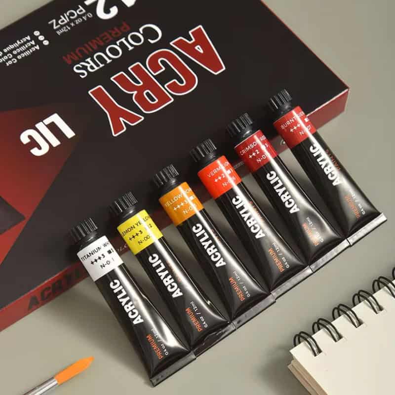 AcryliColor professional acrylic paint set for artists, with vibrant colors including Yellow, Orange, Crimson, and Burnt Sienna, suitable for various creative projects and crafts.