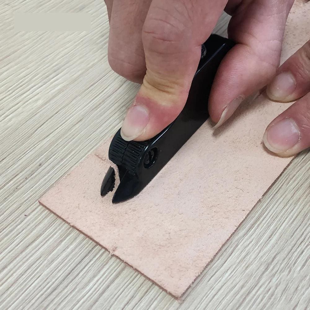Precise leathercraft stitching tool in use, demonstrating professional craftsmanship for high-quality leather and fashion accessories at Monalisa Store.