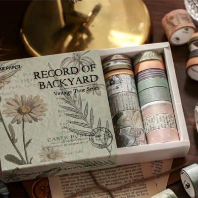 Washi tape set in decorative box, vintage-style craft accessories, Monalisa Store, stationery and scrapbooking supplies for creative projects, perfect for DIY enthusiasts and gift-giving, colorful and artistic design.