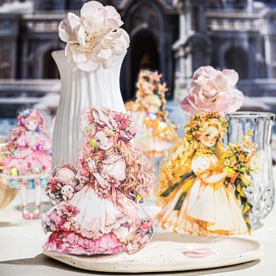 Delicate anime-style paper doll decorations with floral accents at Monalisa Store for unique opt home decor.
