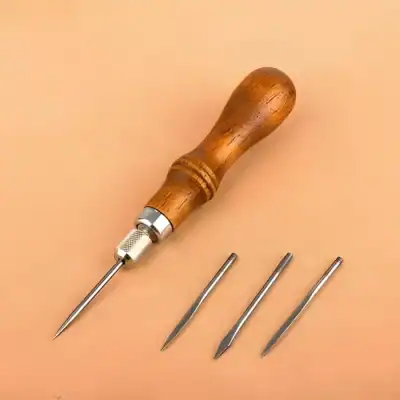 Sharp tattoo needles with wooden handle for professional ink application, essential tools for tattoo artists and body art enthusiasts. Ideal for precise tattooing and customization.
