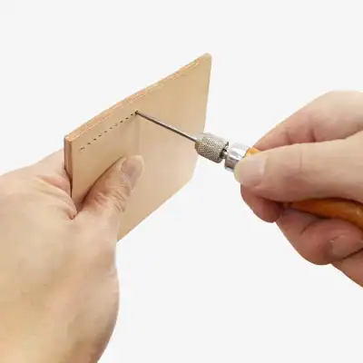 Precision leather hole puncher for stylish custom holes, ideal for leathercraft, crafting, and tailoring projects at Monalisa Store.