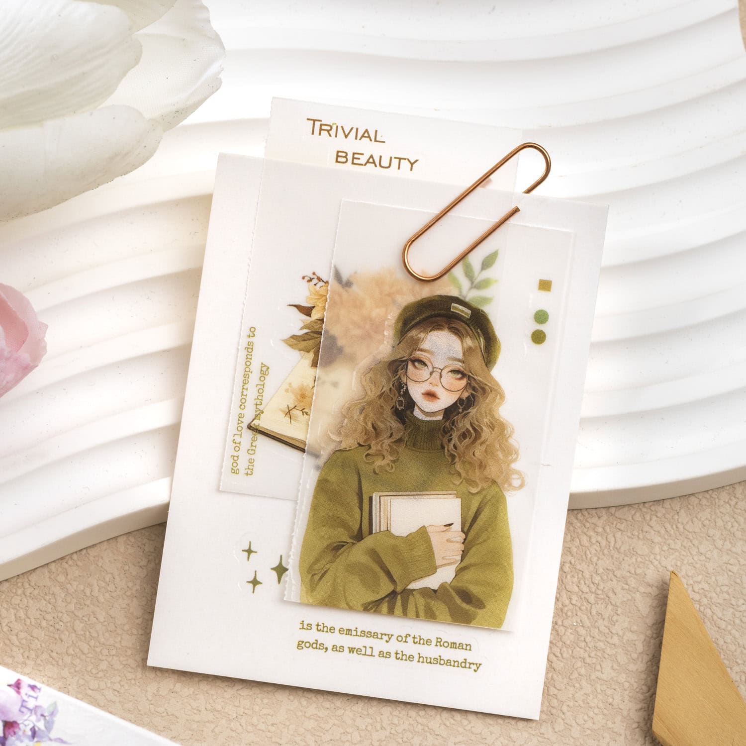 Colorful Monalisa Store promotional bookmark with illustrated woman holding books, decorative paperclip, and elegant background, ideal for optical accessory marketing and branding.