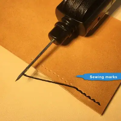 Sewing marks on leather fabric with a sewing machine needle and black thread, close-up view for leather stitching, quality craftsmanship at Monalisa Medical Store.