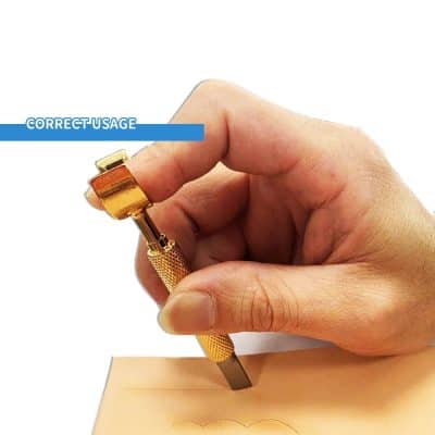 Sharpening precision knife with correct usage label for engraving or woodworking applications.