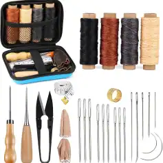 Spool of multicolored sewing thread, sewing repair kit with tools, needles, measuring tape, scissors, thimbles, and needle threader, ideal for artisanal or leatherwork and textile repairs.