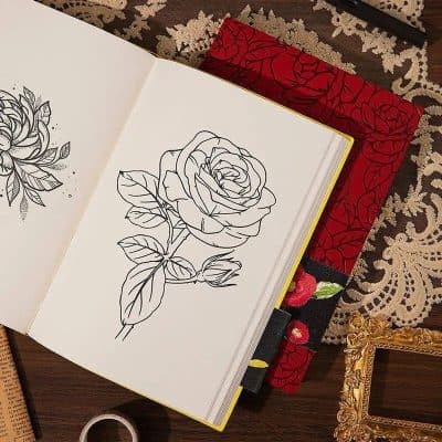 A coloring book page featuring a detailed rose illustration, surrounded by floral designs, perfect for relaxation or creative art activities at Monalisa Store.