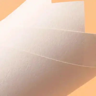 White textured paper sheets stacked together, showcasing smooth edges and a matte finish, suitable for medical or office use. Perfect for printing, filing, or document organization.