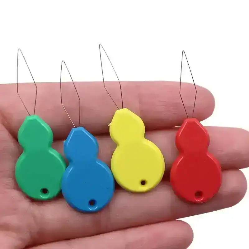 Colorful alarm tags with metal loops, used for eye health and vision safety monitoring in optometry practices. Perfect for optometrists to identify patients' eyewear or equipment.