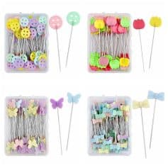 Colorful button-shaped sewing pins in pastel shades, ideal for fabric sewing and craft projects.