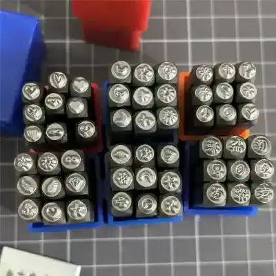 Stamped metal alphabet and number stamps for jewelry making and metalworking tools at Monalisa Store.