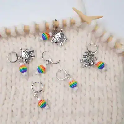 Colorful rainbow striped beads and silver unicorn charms jewelry set, perfect for kids and teen fashion, at Monalisa Store.