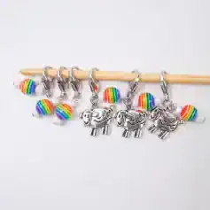 Bright rainbow striped and sheep-shaped earrings, colorful accessories perfect for kids and teens, made with high-quality hypoallergenic materials, stylish and fun jewelry from Monalisa Medical Store.