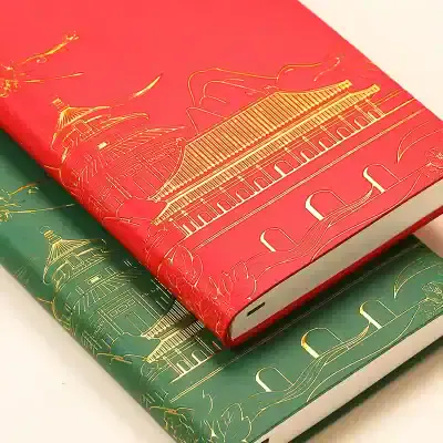 Intricate red and green folders with gold Chinese architectural and floral designs, ideal for premium business or personal use in office and stationary needs.