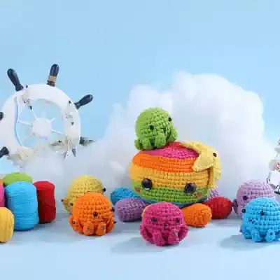 Colorful plush crab and octopus toys display at Monalisa Store for kids' entertainment and decor.