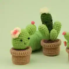 Colorful crocheted cactus and succulent plush toys, perfect for home decor or gifts, featuring adorable faces and flower accents, handmade by Mona Lisa Store.