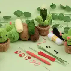 Thick, colorful crochet cactus and succulent plants in decorative pots, craft crochet tools, and accessories, ideal for DIY craft projects, decorations, or gift ideas from Mona Lisa Medical Store.