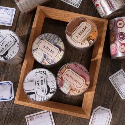 Vintage-style decorative storage tins with bold typography and artistic designs, ideal for kitchen organization or home decor. Perfect for adding a retro touch to your space.