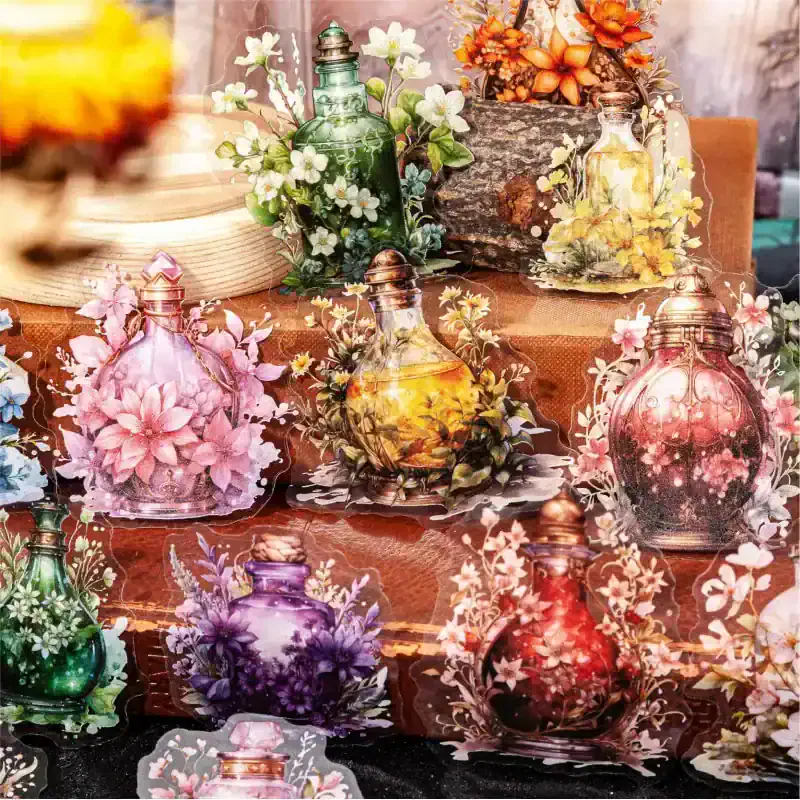 Colorful decorative glass bottles with floral designs for home décor and gifts at Monalisa Store.