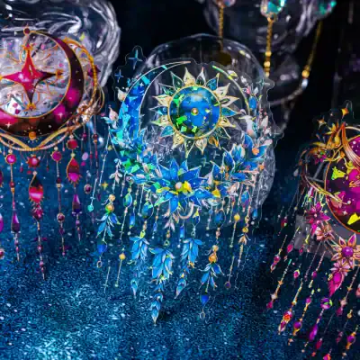 Colorful celestial-themed decorative accessories with intricate holographic details, perfect for enhancing home decor or jewelry displays; vibrant, eye-catching designs.