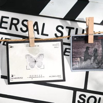 High-quality photoshoot for Monalisa Store, featuring professional camera settings and creative composition, emphasizing the artistic ambiance and focus on photography and visual arts.