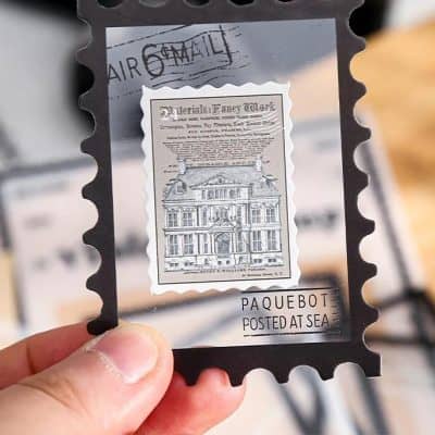 Vintage Mail Art Postcard Frame – Monalisa Store, highlighting unique optical accessories and decorative items. Discover stylish and sophisticated home decor with a touch of vintage charm at Monalisa Medical.