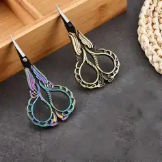 Colorful stainless steel cuticle scissors for nail care, elegant and precise manicure tools.