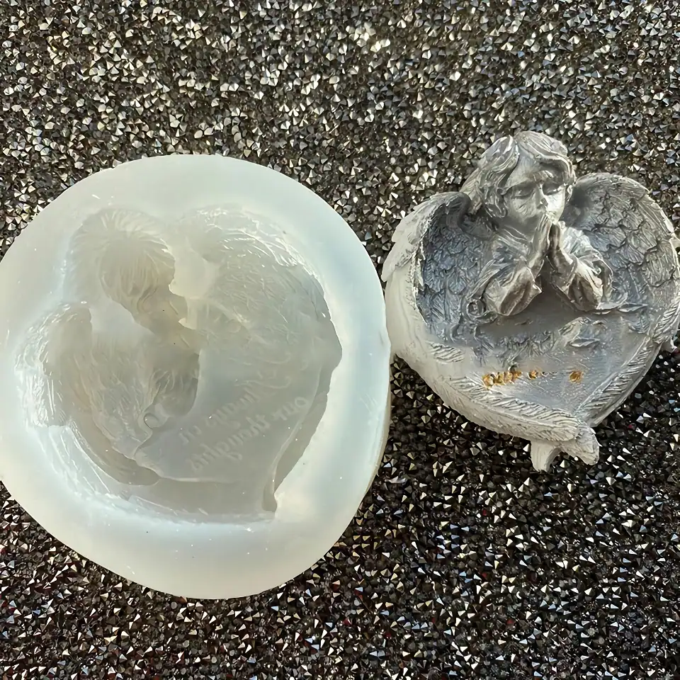 Heart-shaped soap with angel design and a detailed angel figurine on a textured black background, emphasizing premium quality and artistic craftsmanship for Monalisa Medical Store.