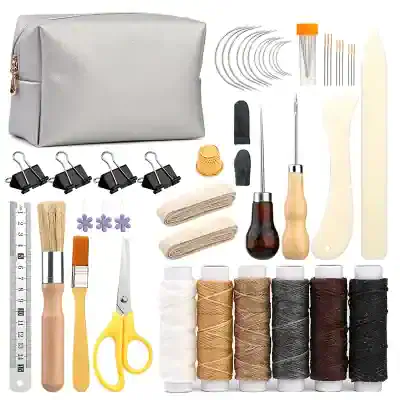 Braided thread and sewing tools for embroidery and needlework at Monalisa Store in a flat lay image, including scissors, needles, thread spools, fabric, and accessories for craft projects.