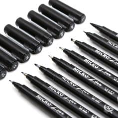 Fine tip black markers and pens for eyeglass lens engraving.
