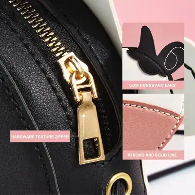 Luxury black leather handbag with gold hardware texture zipper, stylish cow horns and ears design, durable stitching, and premium quality craftsmanship for fashion accessories and daily use.