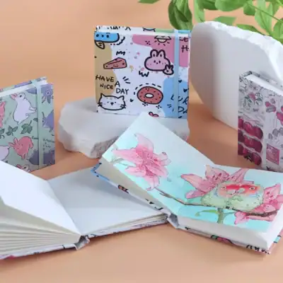 Colorful printed notebooks with cute animal and floral designs, ideal for note-taking or journaling, available at Monalisa Store for stylish stationery lovers.