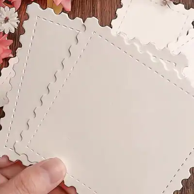 Blank white paper with decorative stitched edges for custom message or invitation design, ideal for optical or eye care-themed projects.