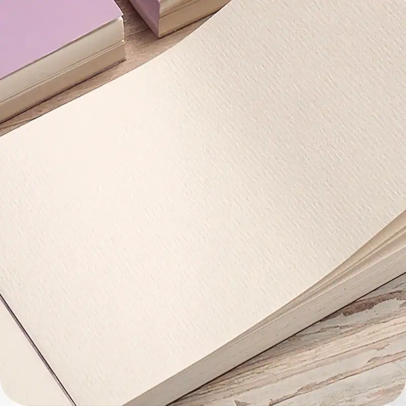 Smooth off-white textured wallpaper sample, ideal for stylish interior decor and eyelid treatment clinics. Perfect for creating a clean, modern aesthetic in medical and retail settings.