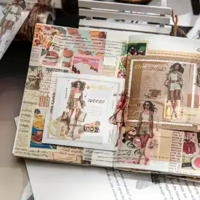 Elegant fashion scrapbook featuring trendy illustrations of women, stylish outfits, and collage design, perfect for creative projects and fashion enthusiasts.