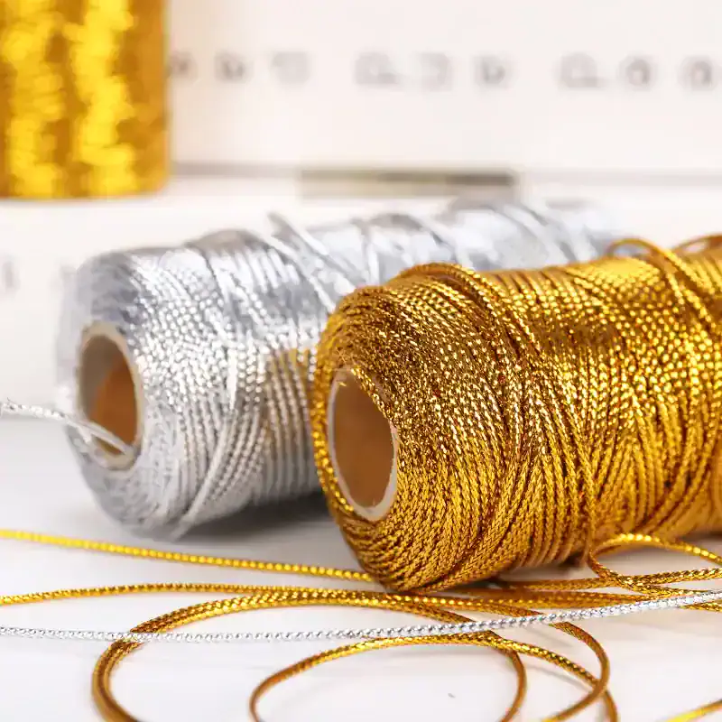 Gold jewelry chains, silver and gold thread spools, Monalisa Medical store opt accessories, luxury jewelry-making supplies, high-quality threading and embellishments.