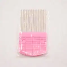 Disposable eyelash extension fan cleaning tool, pink plastic eyelash cleaning brush and comb for salon use.