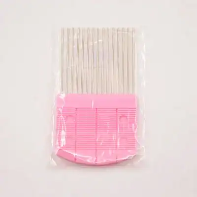 Disposable eyelash extension fan cleaning tool, pink plastic eyelash cleaning brush and comb for salon use.