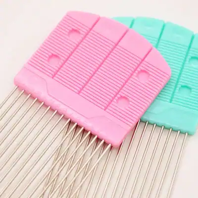 Colorful silicone eyelash extension pads with adhesive tabs and metal tweezers for precise application. Ideal beauty tools for professional eyelash extension technicians.