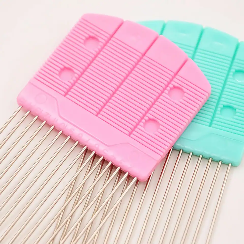 Colorful silicone eyelash extension pads with adhesive tabs and metal tweezers for precise application. Ideal beauty tools for professional eyelash extension technicians.