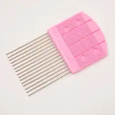Precision eyelash extension tool with stainless steel pins and pink plastic handle for professional beauty treatments.
