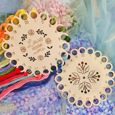 Colorful embroidery thread organizer with floral design, perfect for sewing enthusiasts and craft projects, available at Monalisa Store for quality needlework supplies.
