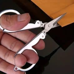 Precision manicure scissors with stainless steel blades for detailed grooming at Monalisa Medical Store. Perfect for precise trimming and personal care.