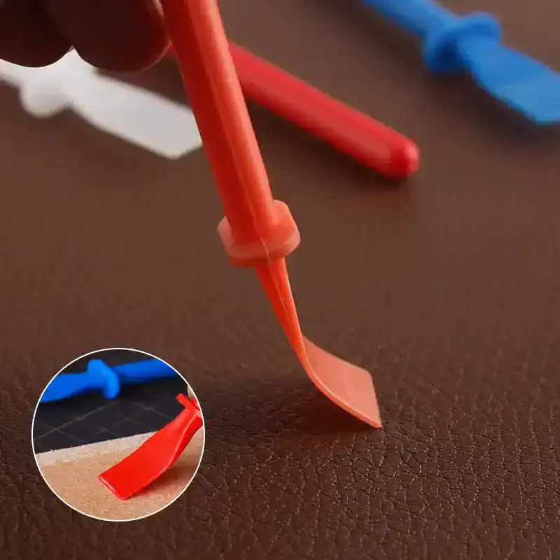 Cutting tool for leather crafting and upholstery, used for precise edge trimming and detailing in furniture and fashion projects.