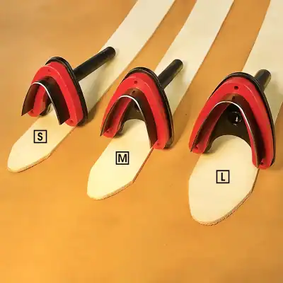 Red measuring and shaping tools for nail extensions, available in small, medium, and large sizes, used in nail art and beauty salon procedures.