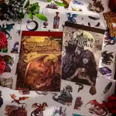 Vape-themed fantasy art sticker books featuring dragons and witches, perfect for collectors and enthusiasts of mystical illustrations and fantasy characters.