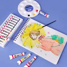 Brightly colored watercolor paints, sketchbook with an illustration of a girl holding a yellow umbrella, and art supplies on a pastel blue background, ideal for art and painting enthusiasts at Monalisa Store.